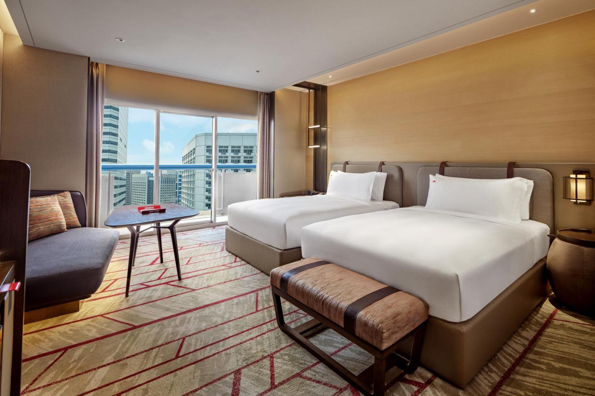 Swissotel The Stamford Singapore Exterior photo Deluxe Room